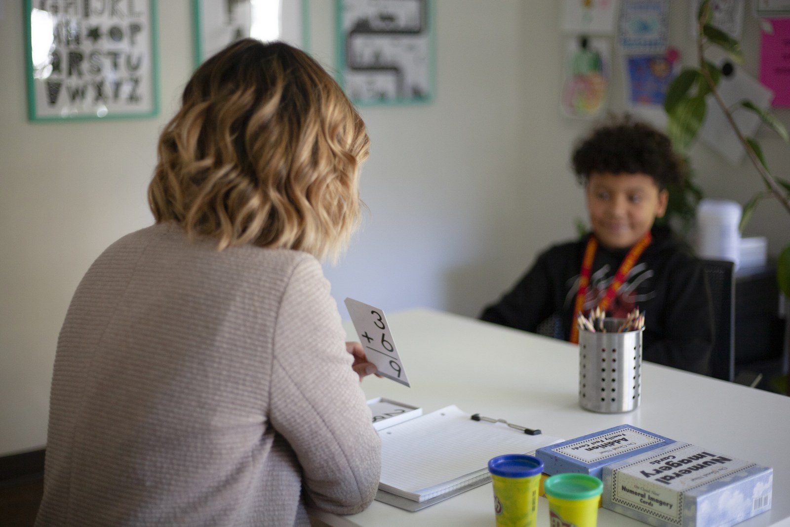 Over-the-shoulder view of a student working with an instructor in a one-on-one Novaread session
